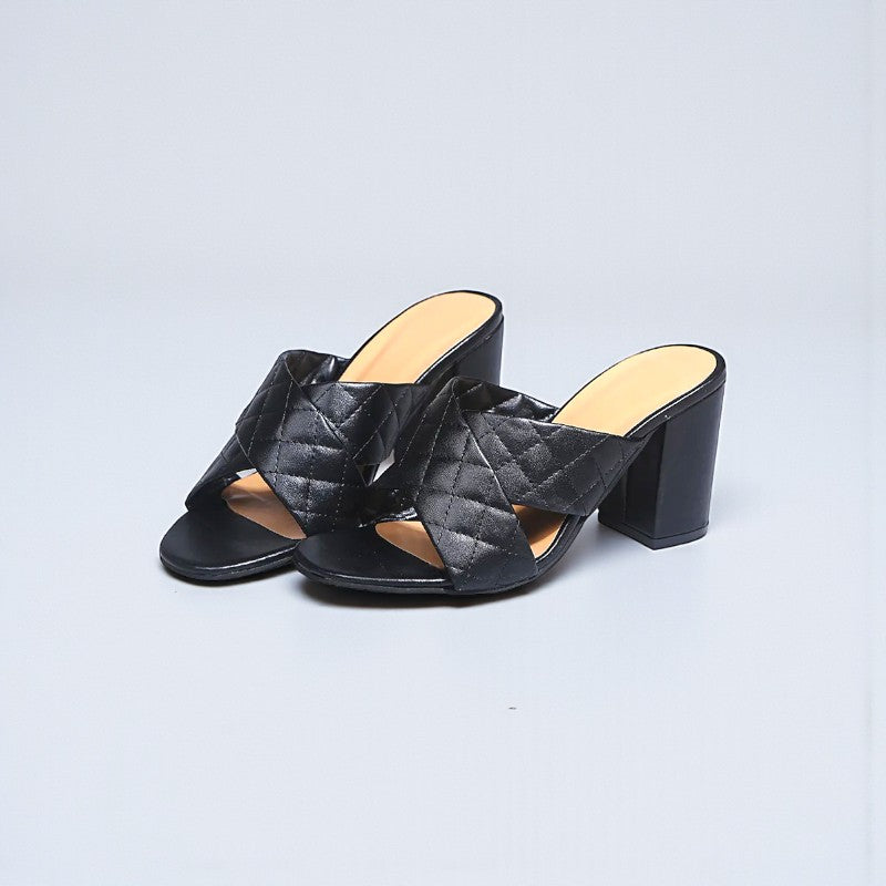 Mules à talons noirs